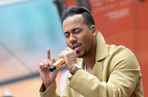 What are some popular songs by Romeo Santos?